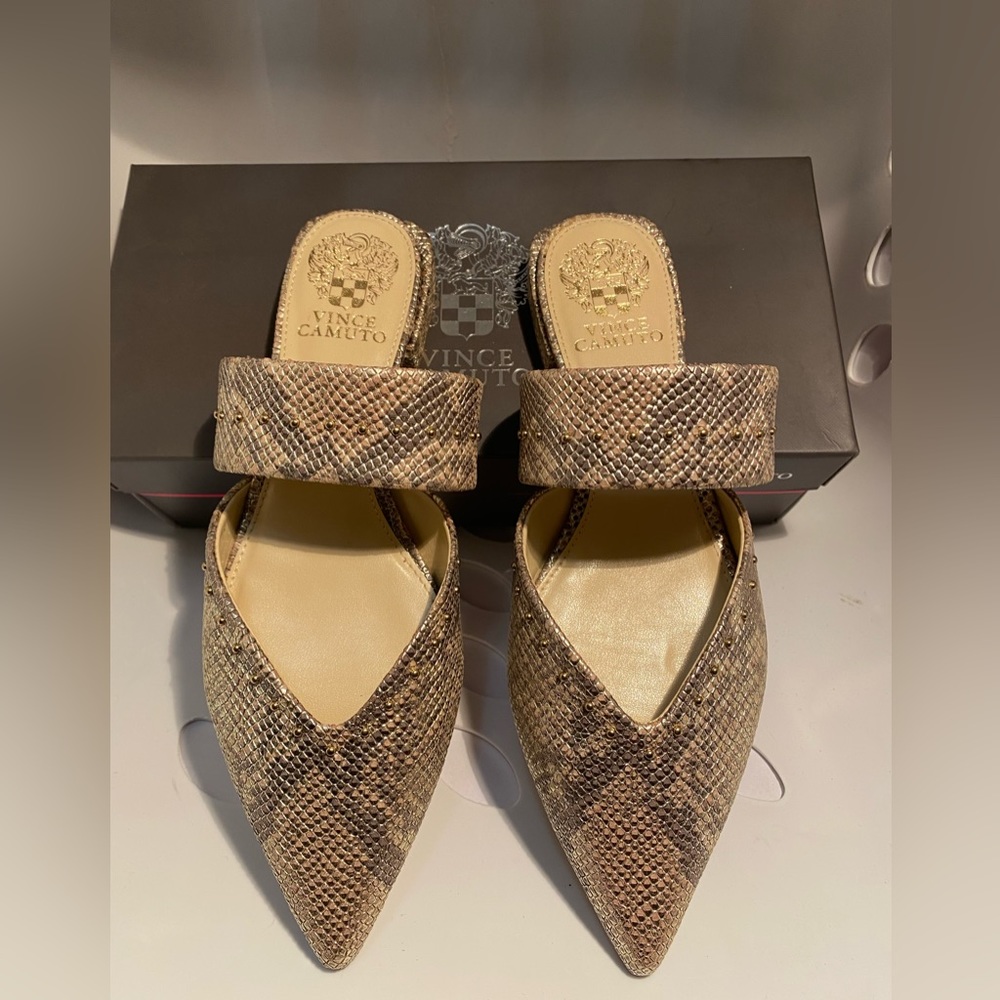 Vince Camaro gold slides.